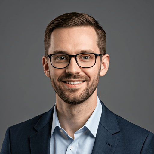 Grayscale professional headshot of lead developer
